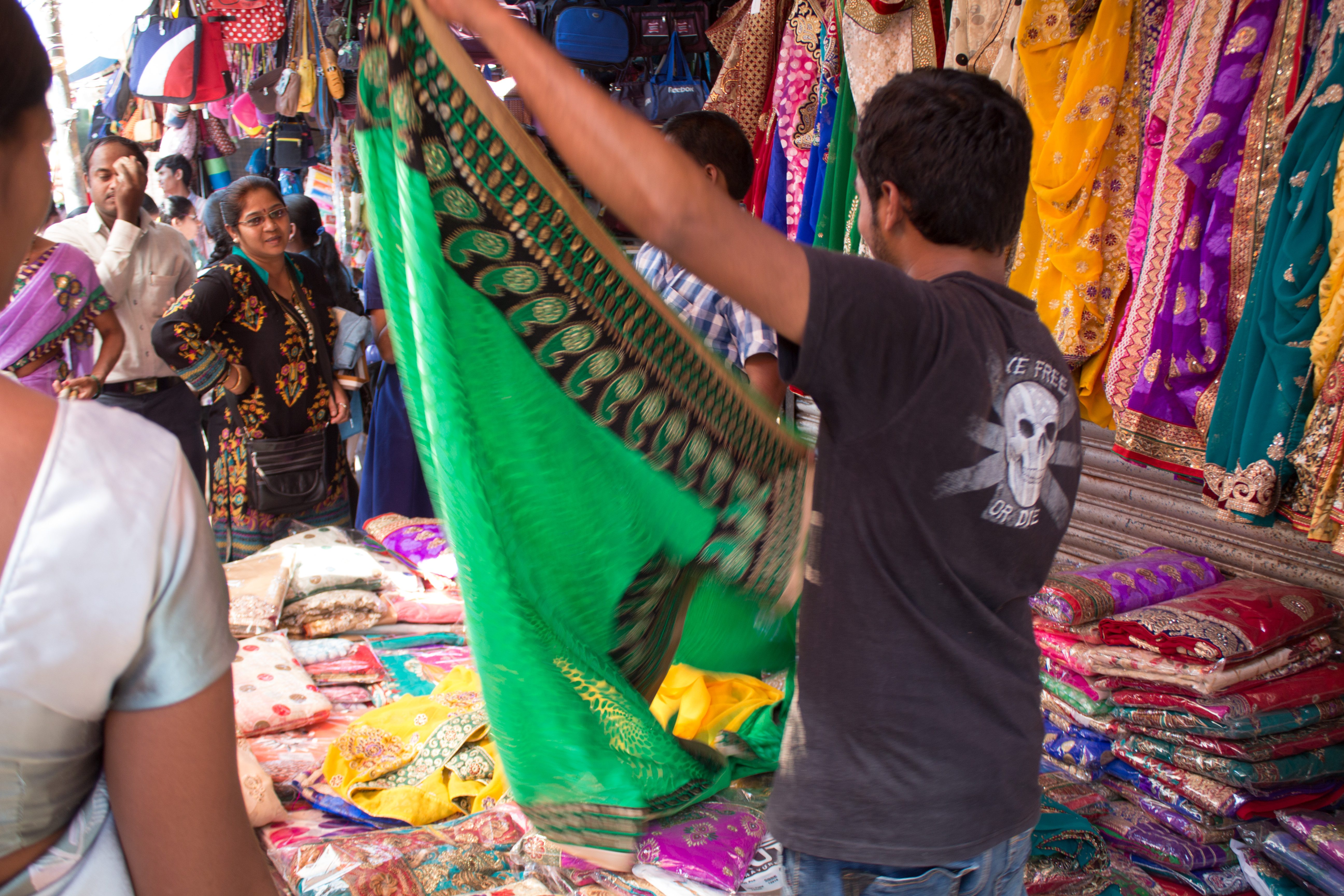 Shopping for saris at Mapusa Market
