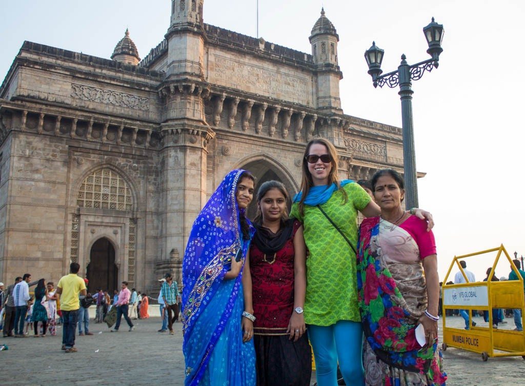 Making friends at the Gateway of India in Mumbai wearing Indian kurta, dupatta and churidar.