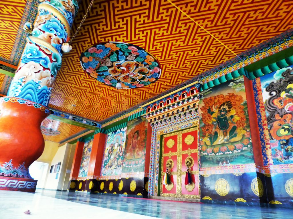 The incredible doors and elaborate details inside the Palpung Sherabling Monastery nestled in the forests outside Bir