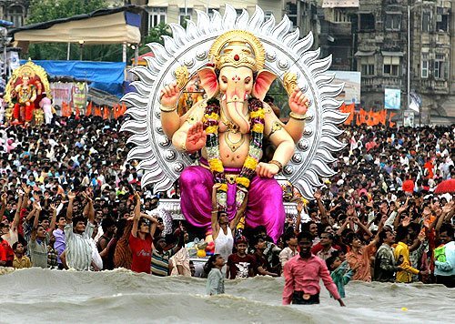 Ganesh being immersed in the water for Ganesh Chaturthi