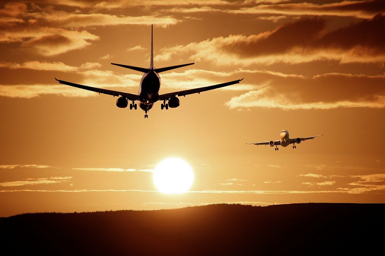 airplane sunset flying