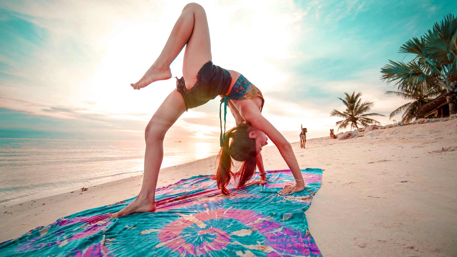 Yoga on the beach in Koh Phangan, Thailand Yoga on the beach in Koh Phangan, Thailand