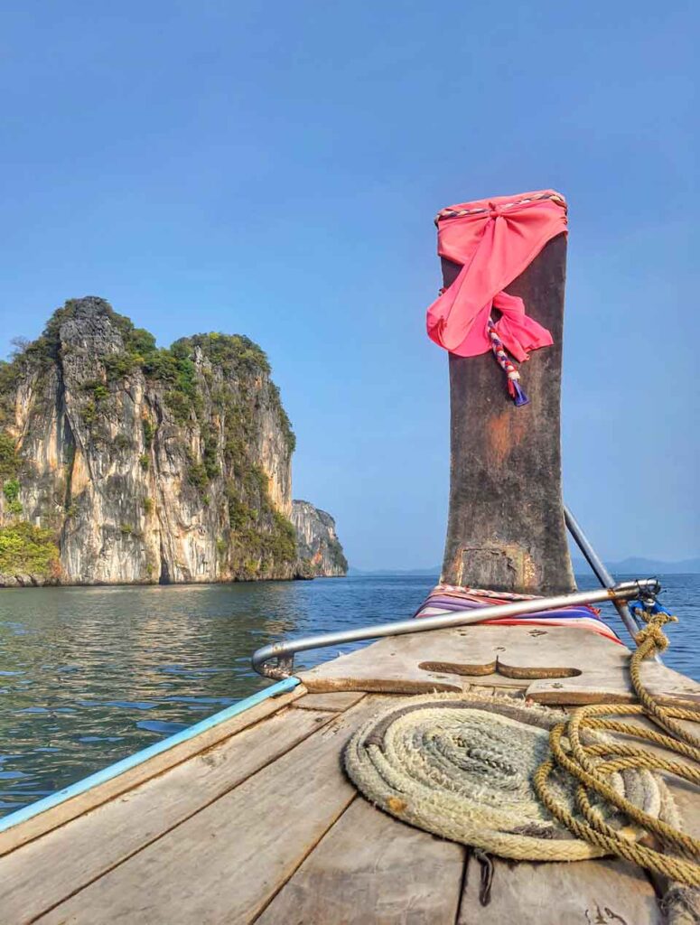 island hopping in krabi thailand on a long tail boat