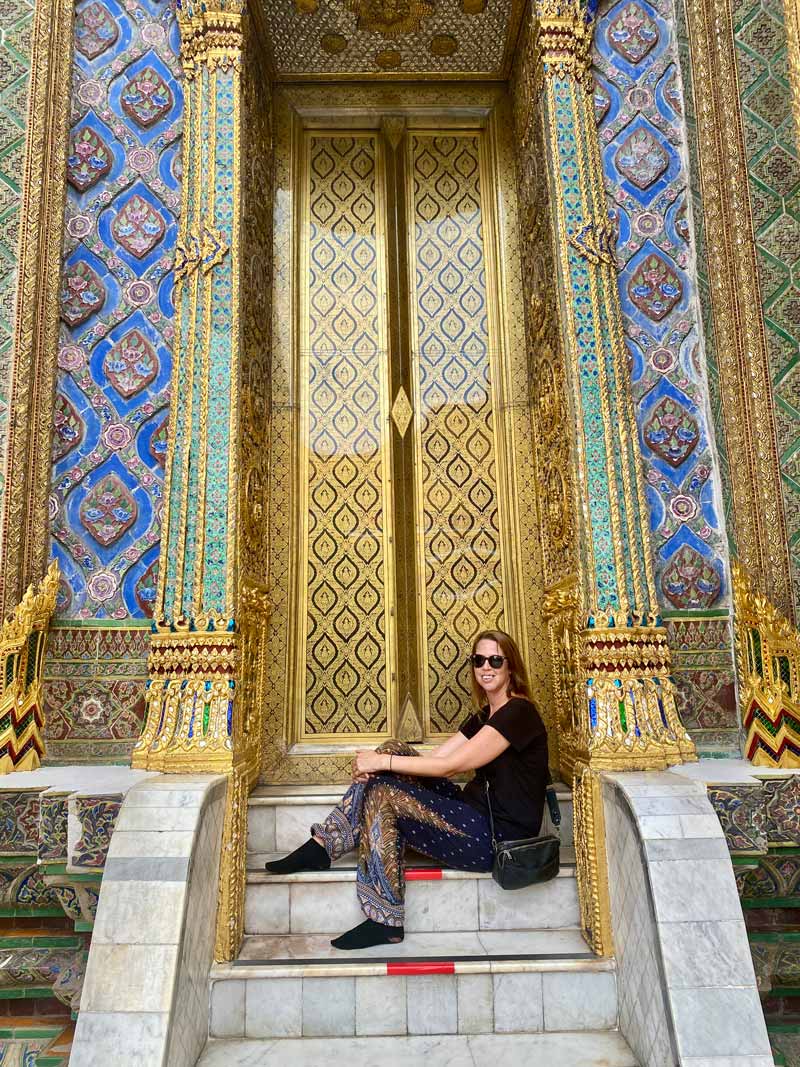 anna at the grand palace bangkok doorway